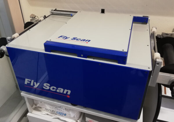 Scanner Aerofotogrammetrico FLY SCAN per la digitalizzazione a 2500Dpi di immagini aeree storiche su pellicola fotografica.